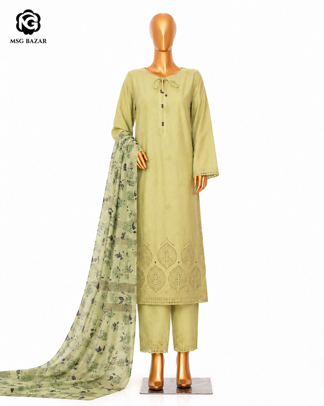 A three-piece olive green ethnic suit displayed on a mannequin, featuring a long-sleeve embroidered kurta, matching trousers, and a sheer printed dupatta. The logo for 'MSG BAZAR' is visible in the top-left corner.