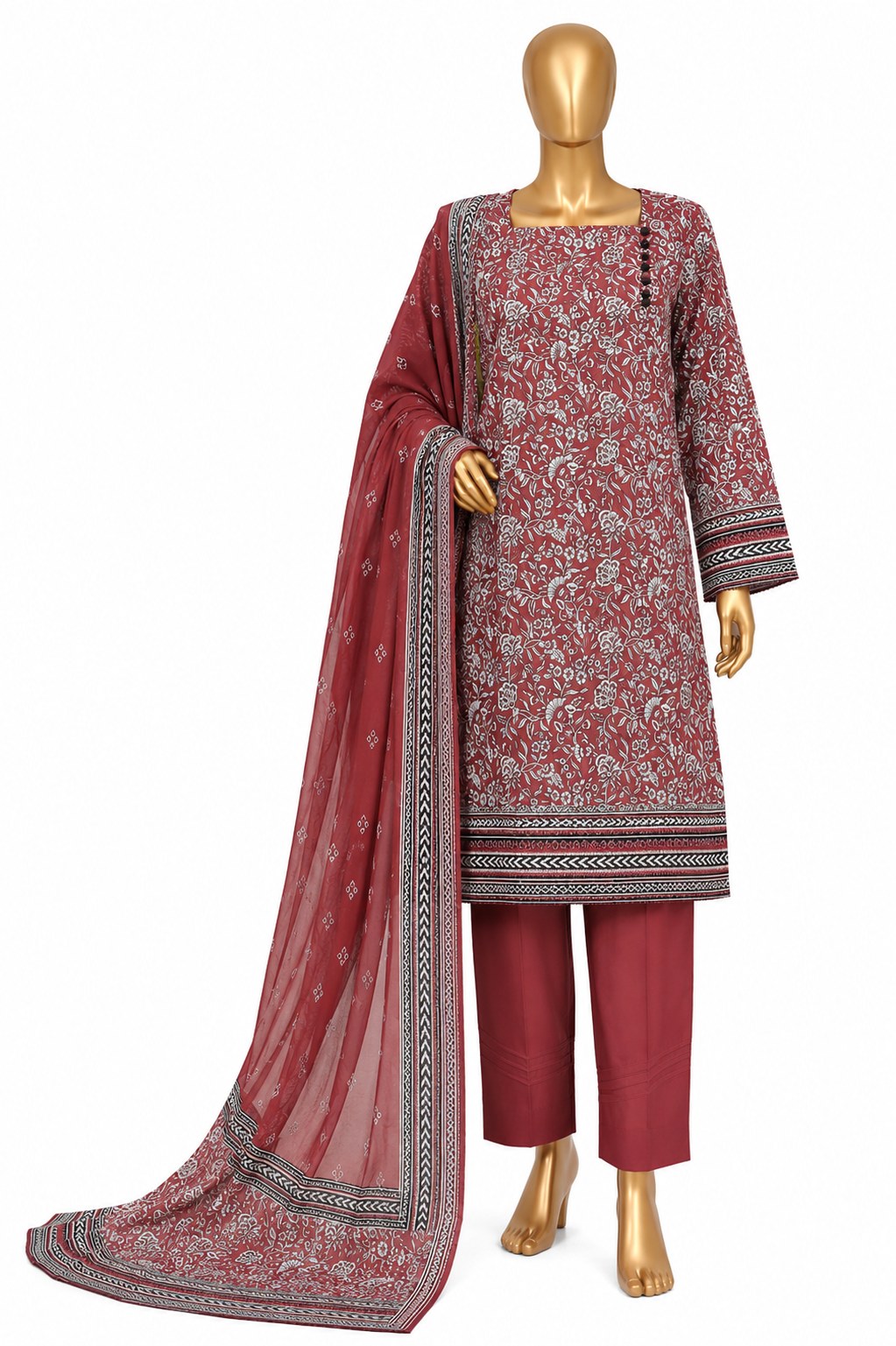 A three-piece women's salwar kameez suit set displayed on a gold mannequin. The set features a dusty rose printed kurta with silver floral motifs, matching solid trousers, and a sheer printed dupatta with a decorative border.