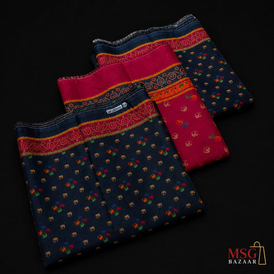 Three folded navy blue sarees with colorful floral patterns and bright pink borders, arranged diagonally on a black background. A 'MSG BAZAAR' logo is visible in the bottom right corner.