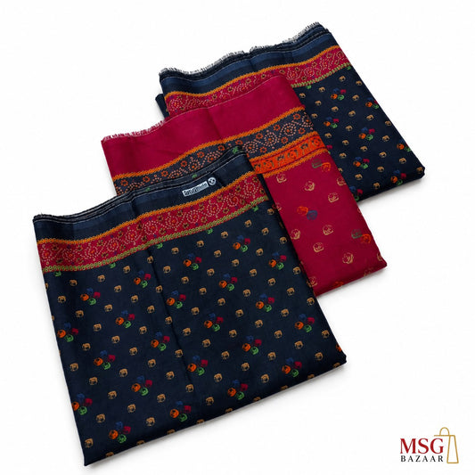 Three folded pieces of printed fabric laid out on a white background, featuring a navy base with small multicolor motifs and a wide red border with gold detailing. A small MSG BAZAAR logo appears in the bottom right corner.