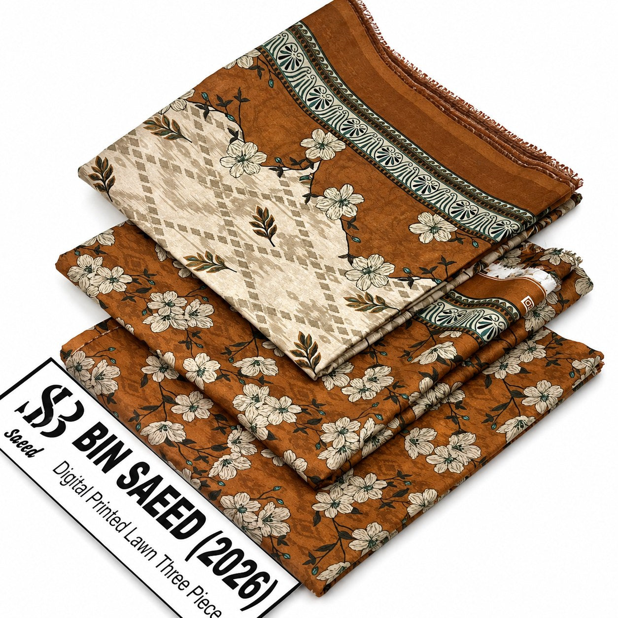 Three folded pieces of lawn fabric in a digital print design, featuring a warm brown base with cream floral patterns and a decorative border. A white label at the bottom left reads '50 BIN SAEED (2026) Lawn Digital Printed Lawn Three Piece'.