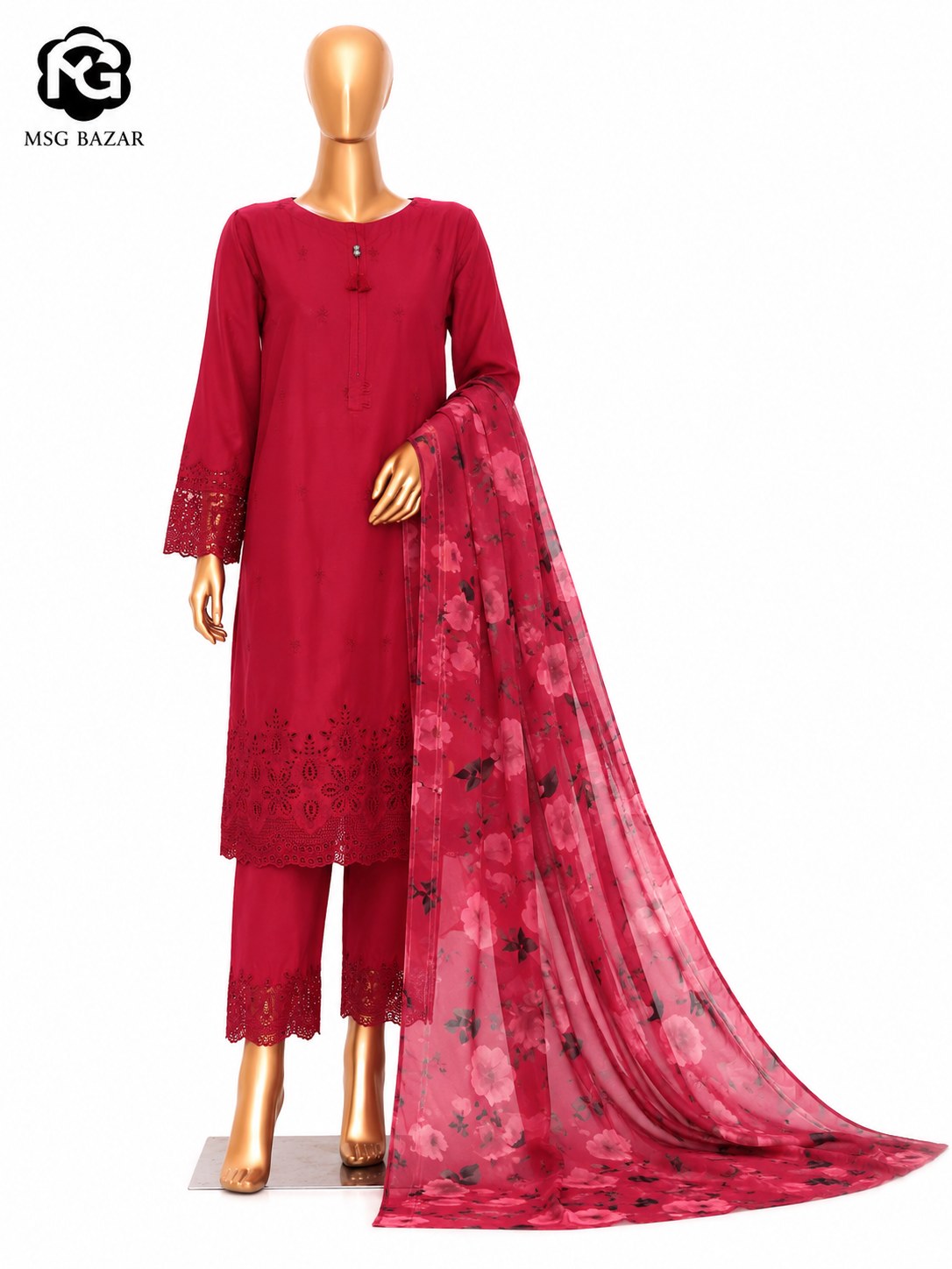 A three-piece red ethnic salwar kameez suit displayed on a gold mannequin, featuring a long-sleeved embroidered kurta, matching trousers, and a sheer floral dupatta. The MSG BAZAR logo is visible in the top-left corner.