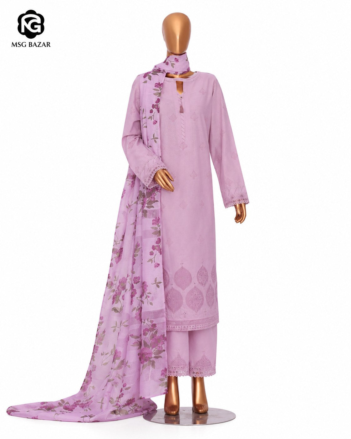 A lavender purple three-piece ethnic suit displayed on a mannequin, featuring a long-sleeve kurta with floral embroidery, matching trousers, and a matching dupatta with a floral pattern. The image is set against a plain white background with an 'MSC BAZAR' logo in the top-left corner.