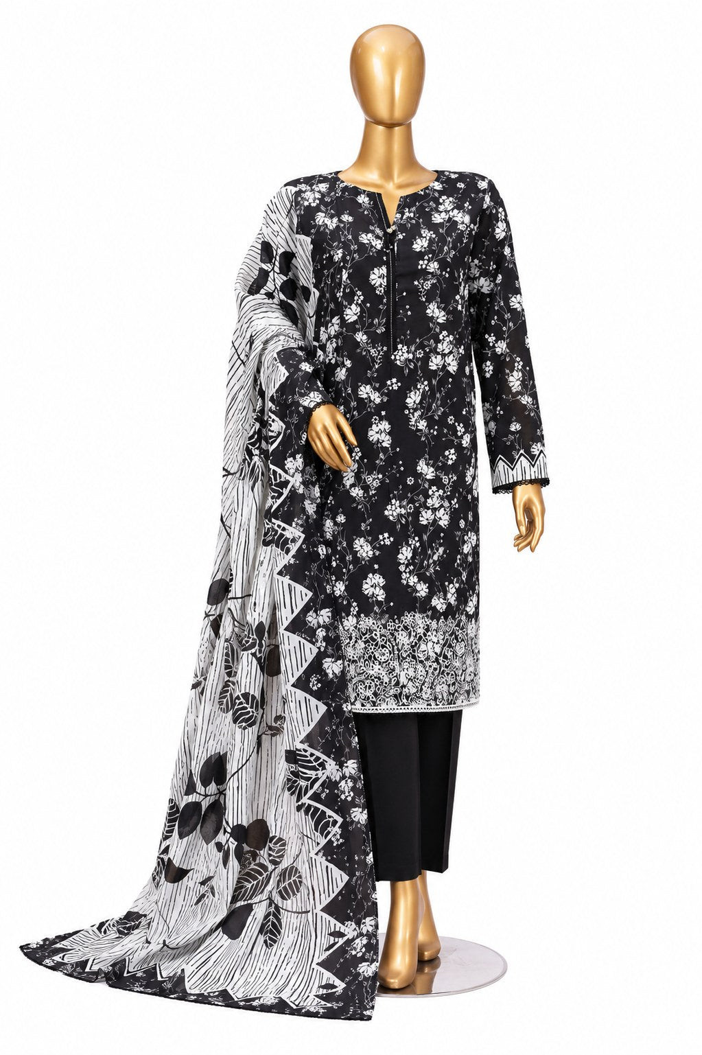 A three-piece women's salwar kameez suit set displayed on a gold mannequin. The set features a black kameez kurta with white floral patterns, black trousers, and a matching dupatta with a black and white abstract pattern.